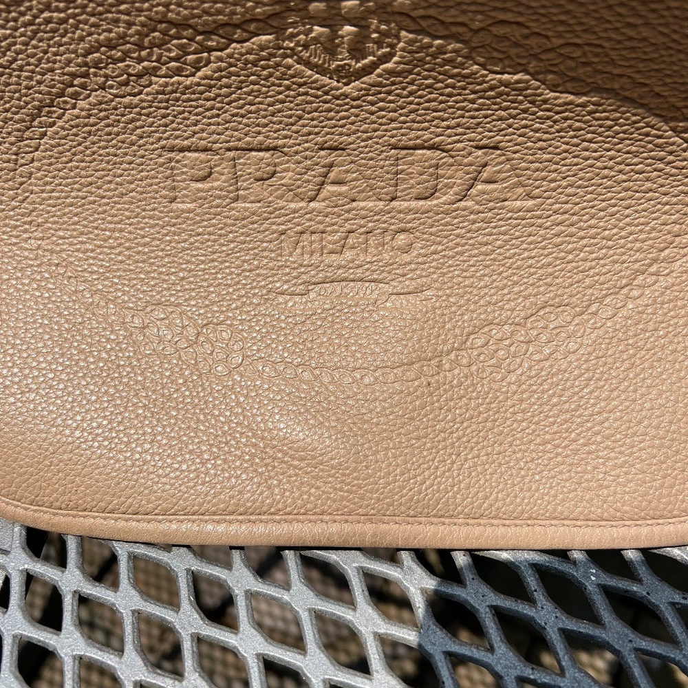 Prada Vitello Pebbles Leather crossbody in Camel color